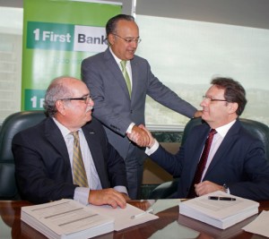 From left: Dacio Pasarell, chief banking operations officer of FirstBank; FirstBank President Aurelio Alemán; and Marcelo Annarumma, managing director, FIS Latin America and Caribbean.