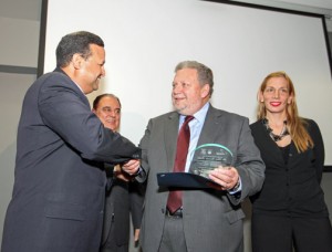 Caguas Mayor William Miranda-Torres, bestows a recognition to Luis García-Feliú, veteran member of the Inova advisory board, as Inteco President Oscar Jiménez, and Zamia Baerga, Caguas Economic Development Secretary look on.