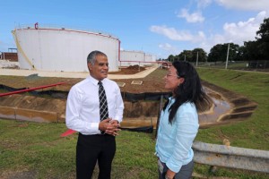 Víctor Domínguez, general manager of Puma Energy Caribe, LLC and company executive Brenda Toraño tour the Bayamón complex.