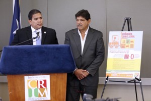 CRIM Executive Director Víctor Falcón-Dávila (at podium) and CRIM Chairman Eduard Rivera Correa.