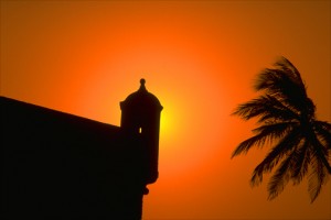 Dramatic sunset over an ancient sentry box in the Caribbean port of Cartagena. (Credit: Larry Luxner)