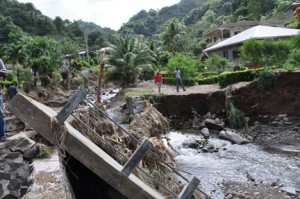 Part of a bridge is washed away in St. Vincent following Dec. 24 torrential rains. (Credit: Larry Luxner)