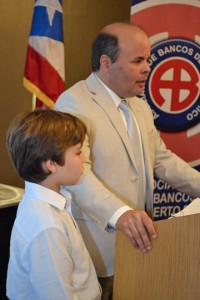 Eniel Torres-Ojeda, president of Productos La Finca, during his award acceptance speech this morning at SBA’s Small Business Week Awards Ceremony. With him, his son Adrián.