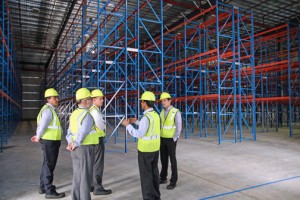 Local and stateside Nestlé officials tour Payco Foods' new Bayamón headquarters.