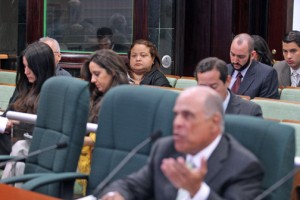 Treasury Secretary Melba Acosta watches as OCIF Chief Rafael Blanco testifies Tuesday morning.