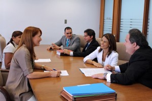 Oriental Bank and Bettina Cosmetics executives meet to announce the loan approval.