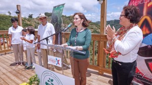 Last month, Tourism Chief Ingrid Rivera (at podium), flanked by Agriculture Secretary Myrna Comas, right, inaugurated Hacienda Tres Ángeles in Adjuntas.