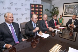 From left: Economic Development and Commerce Secretary Alberto Bacó, Jaime Fonalledas, Manuel Catedral, Francisco Chévere and EDB President Joey Cancel discuss details of the competition.