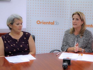 Lola Yglesias, executive director of Enactus Puerto Rico and Alexandra López-Soler, senior vice president of marketing and public relations for Oriental offer details of the new partnership.