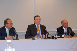 From left: FirstBank CEO Aurelio Alemán, Banco Popular President Richard Carrión and Financial Institutions Commissioner Rafael Blanco offer details of Friday's events during an early evening news conference. (Credit: Sin Comillas)