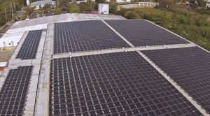 The roof-mounted array will reduce electricity costs for the distribution warehouse, starting with projected savings of more than $100,000 in 2015 and up to $200,000 per year by 2040. 