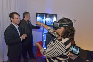 Sacred Heart University President Gilberto J. Marxuach-Torrós (left) observes a demonstration of one of the technologies to be featured at the center.