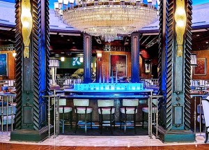 El San Juan Hotel's iconic chandelier anchors the lobby area.