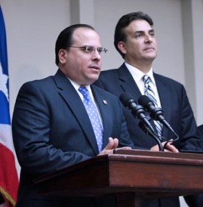 House Speaker Jaime Perelló (right) offers details of the amendments to Law 62.