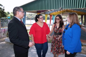 From left: EDB's Vice President of Business and Commercial Banking; Ivette Pérez, representative of the Las Curías special community in Cupey; OFSA Coordinator María Lourdes Rivera; and Ramonita Otero, VP of the EDB's credit department gather for the signing of the agreement.
