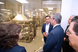 Gov. García-Padilla, right, walks through the plant Tuesday.