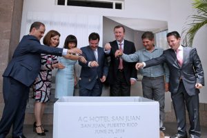 Hotel and government officials conducted the brand’s cornerstone ritual that calls for placing a handful of commemorative coins into the foundation plot with the hotel’s name and its opening date.