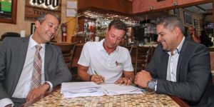 During the signing, from left: FirstBank's Ildefonso Rodríguez, Alex Gomez, president of Tijuana's Bar & Grill, and y Felix Planas, of FirstBank's Small Business Unit.
