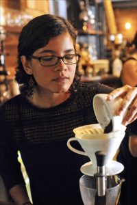 Professional barista Viviana Cruz prepares an espresso at Gustos Café in Guaynabo. (Credit: Larry Luxner)